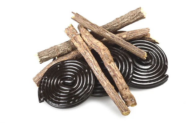 Licorice roots and licorice black — Stock Photo, Image