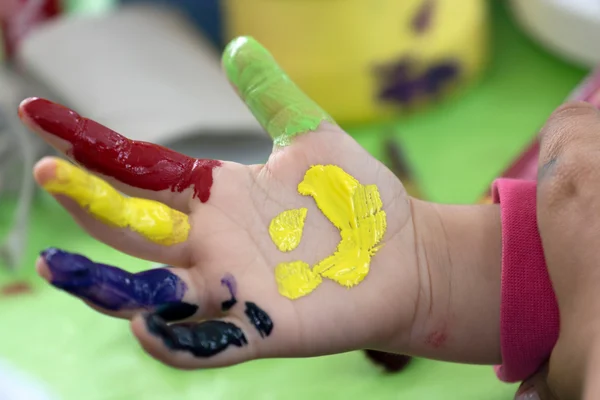 Background with kid painted hand — Stock Photo, Image
