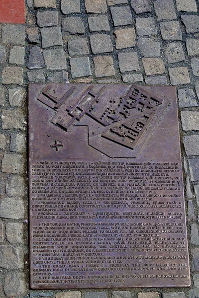 Metal plate in the pavement — Stock Photo, Image