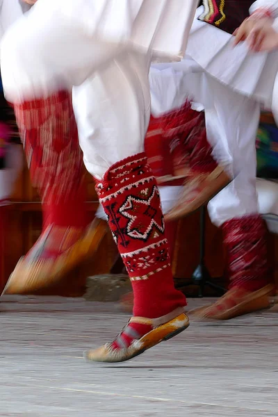 Bulgarian dancers legs in a traditional dance