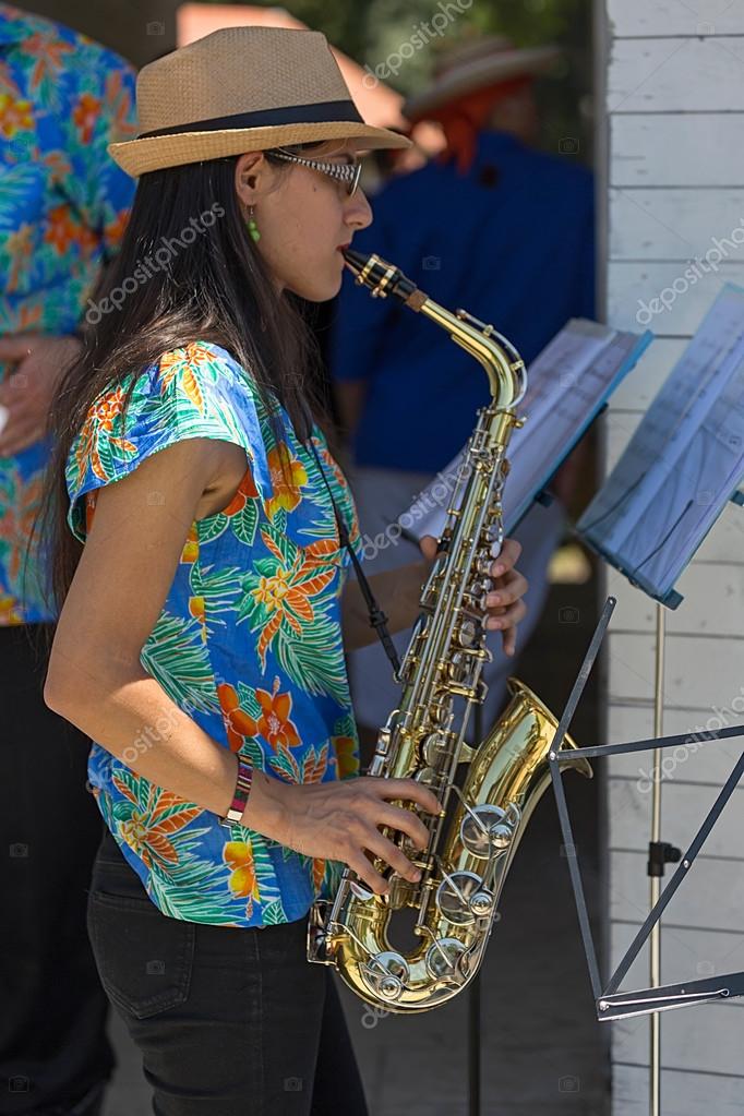 Young singer girl at saxophone from Costa Rica Stock Editorial Photo
