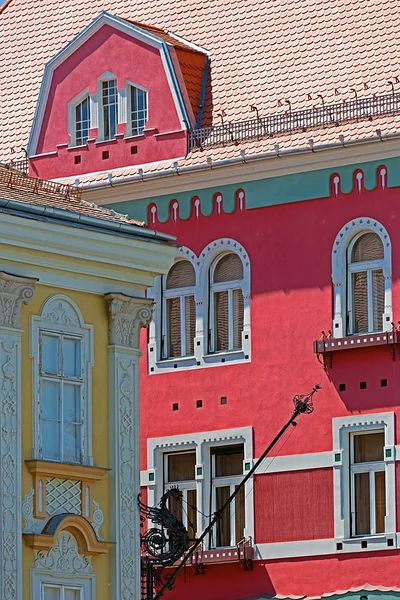 Historic buildings and medieval metal ornament — Stock Photo, Image