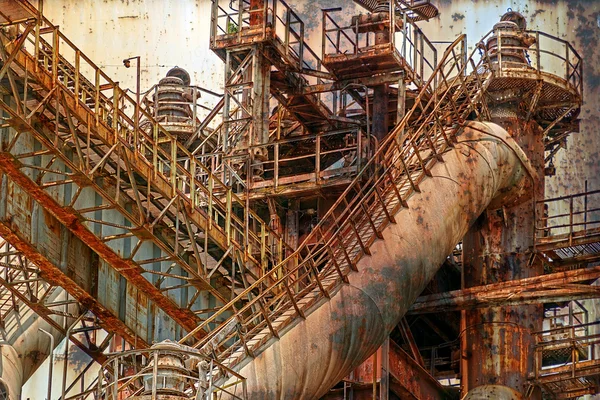 Rusty background with old steel furnace — Stock Photo, Image