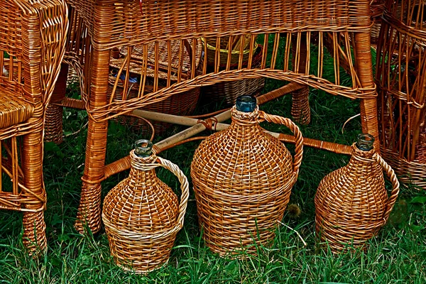 Furniture and jugs made from twigs and wicker — Stock Photo, Image