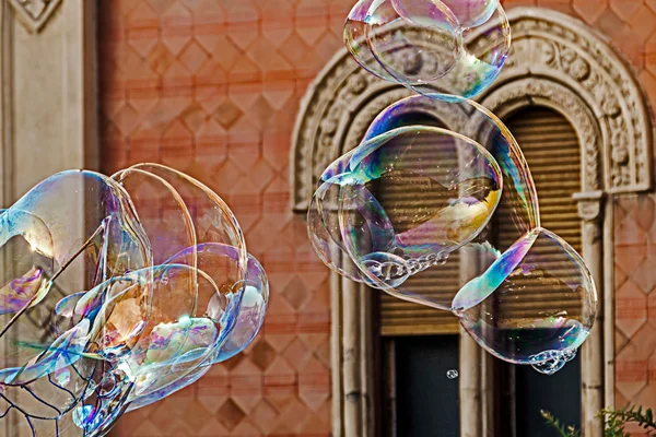 Giant soap bubbles and historic building — Stock Photo, Image