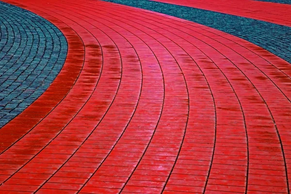 Kopfsteinpflaster Bürgersteig aus roten und grauen Steinen 1 — Stockfoto