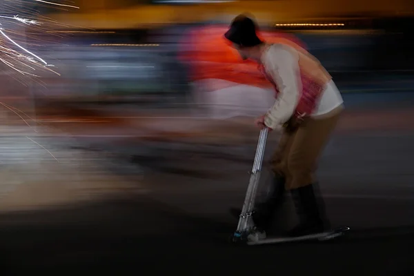 Abstract moving scooter man on blurred background — Stock Photo, Image