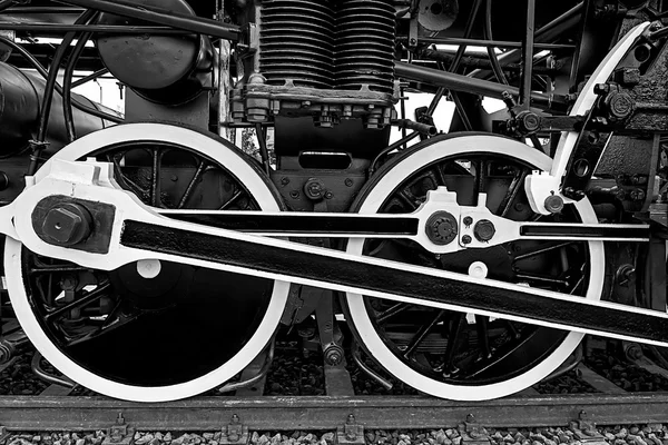 Black and white detail and close up of huge wheels at one old st — Stock Photo, Image