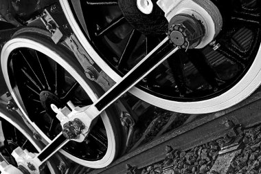 Black and white detail and close up of huge wheels at one old st clipart