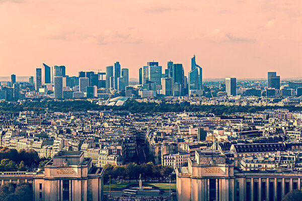 Aerial view from Eiffel tower, with Trocadero place and La Defense financial district in Paris, France.