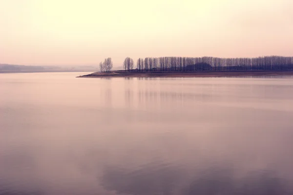 Lonely shores at sunrise Stock Image