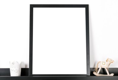 Mock up poster frame in home interior background clipart