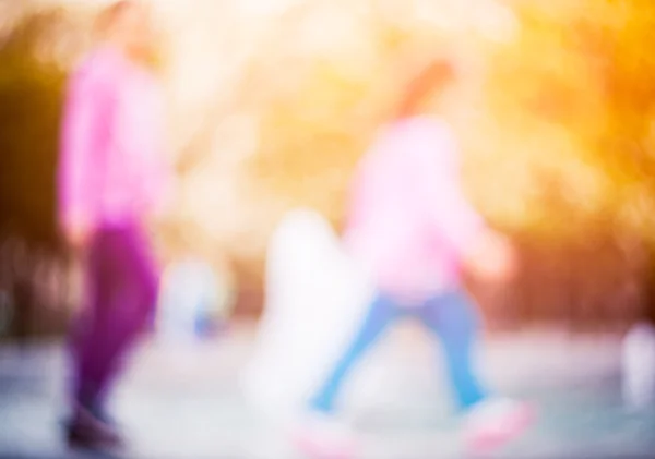 Blurred image of children playing outdoor — Stock Photo, Image