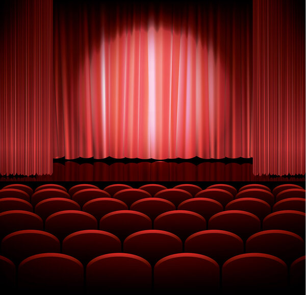 Theater stage with red curtain and spot light