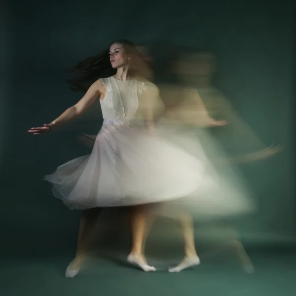 Ballet dancer woman in motion blur, ballerina