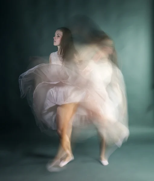 Ballet dancer woman in motion blur, ballerina