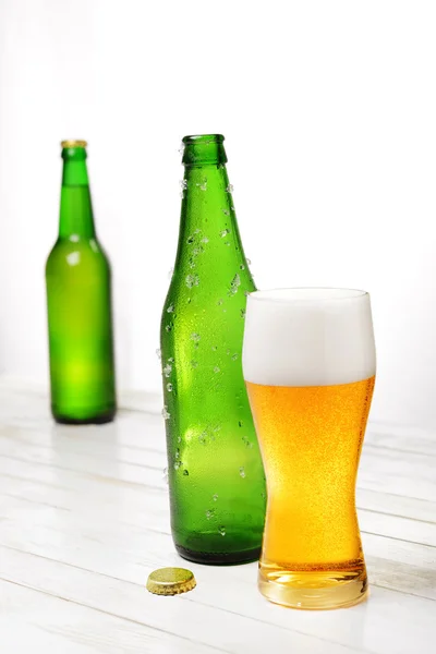 Glas en flesje bier — Stockfoto