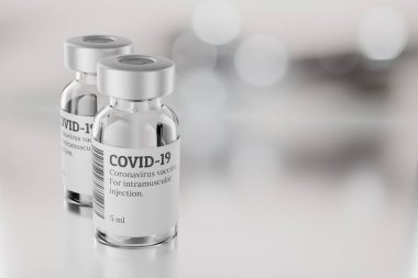 Gri arka planda COVID-19 aşı şişeleri var. Aşı konsepti. 3d resimleme.