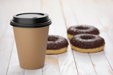 Beyaz ahşap masa üstünde çikolatalı çöreklerle tek kullanımlık boş Kraft kağıt kahve fincanı. 3B resimleme.