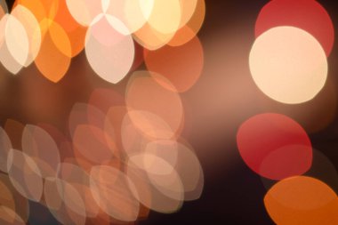 Bulanık ışıklar turuncu arka plan. Eğim kaydırma lensi bulanıklığı.