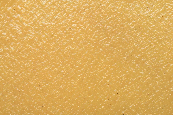 黄色いマスタードソースケチャップの食感の背景が近い — ストック写真