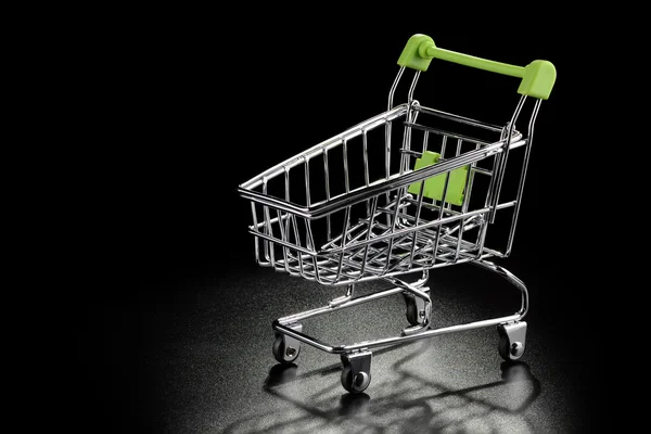 Shopping cart on a black background — Stock Photo, Image