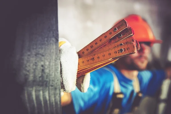 Worker with Measuring Tool — Stock Photo, Image