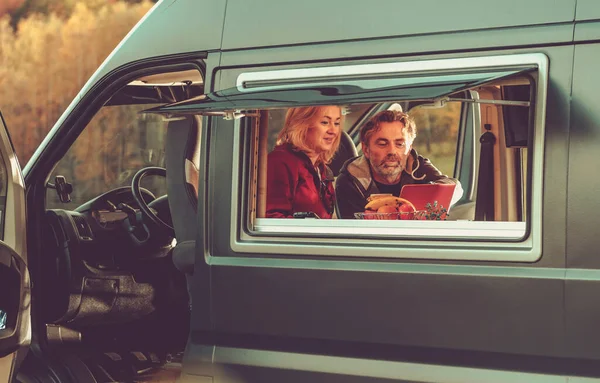 2015 Caucasian Couple Watching Movie Online Modern Camper Van Weekend — 스톡 사진