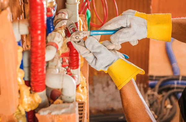 Caucasian Plumber Finishing Whole New Water Supply System Concrete Blocks — Stok Foto