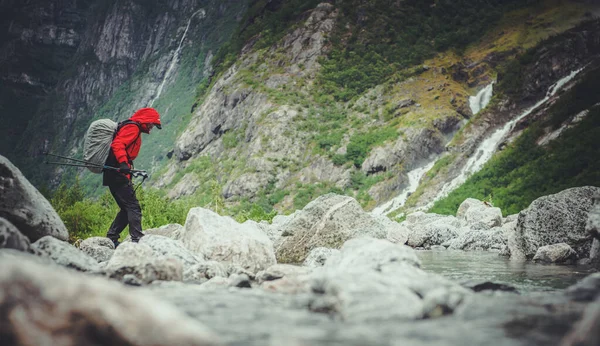 Caucasian Hiker Wearing Red Raincoat Scenic Alpine Trailhead Walking Dramatic — Stock Photo, Image