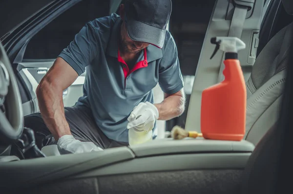 Caucasian Car Detailer Cleaning Modern Vehicle Interior Using Professional Detergents — ストック写真