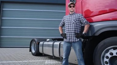 June 6, 2021. Krakow, Lesser Poland. Transportation Industry. European Caucasian Trucker in His 40s and the Truck Stop.