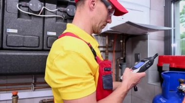 June 1, 2021. Krakow, Lesser Poland. Worker Looking For Gas Leaks Using Professional Detector