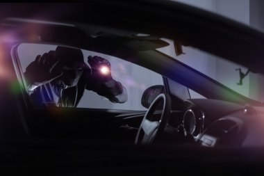 Car Robber with Flashlight clipart