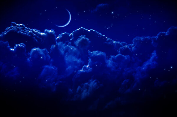 Night sky with stars and clouds. Thin arc moon. Dark blue tint