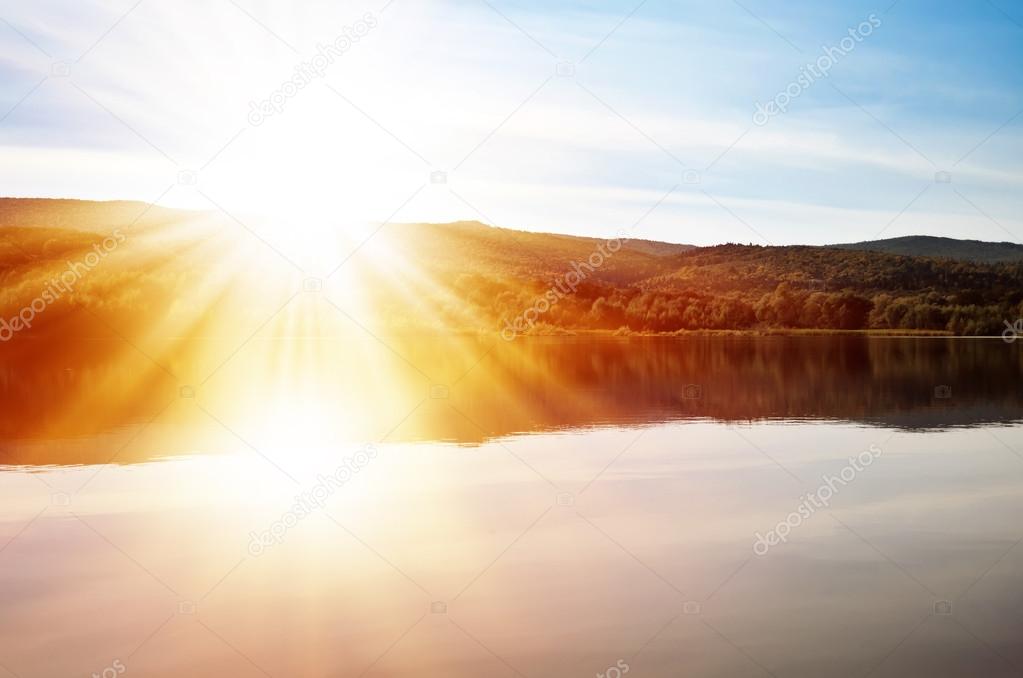 sun over lake