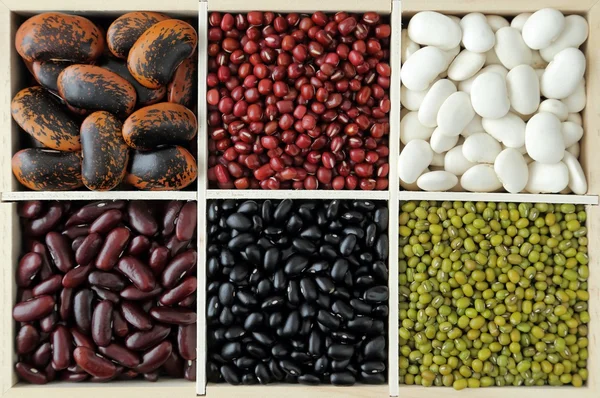 Colorful beans in a wooden box. — Stock Photo, Image