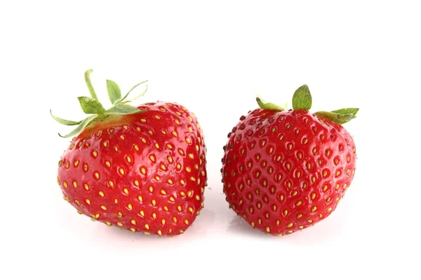 Two fresh juicy strawberries on a white background. — Stock Photo, Image