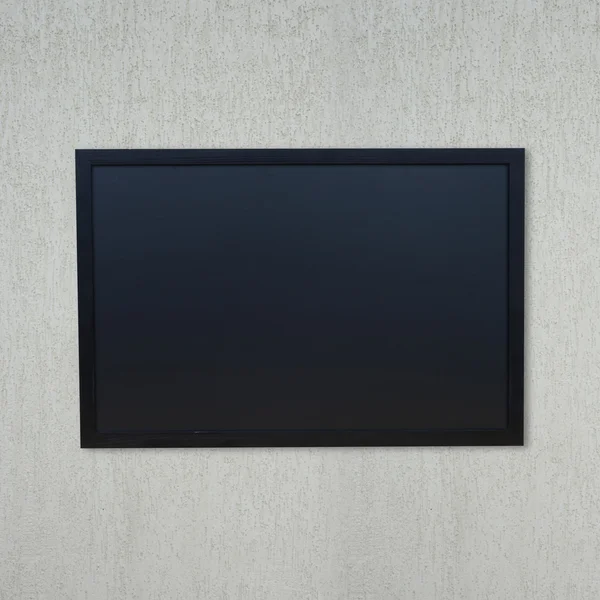 Tableau noir accroché au mur — Photo