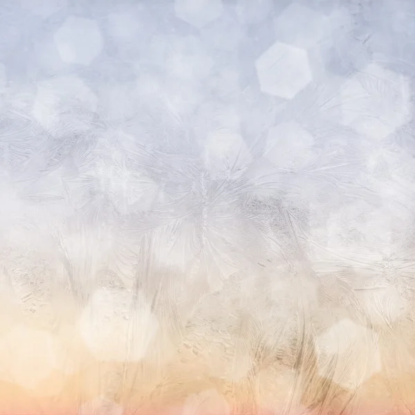 Frost patterns on window. Festive bokeh background — Stock Photo, Image