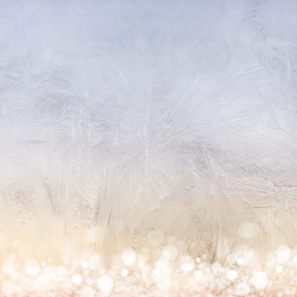 Frost patterns on window. Festive bokeh background — Stock Photo, Image