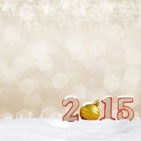 クリスマスの背景 - 雪の吹きだまりと抽象的なボケ味のライトと新年 2015年記号 — ストック写真
