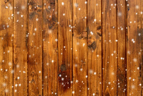 Wood texture background with snowflakes — Stock Photo, Image