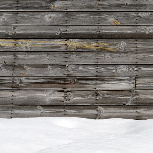 Cumulo di neve su tavole di legno con spazio vuoto — Foto Stock