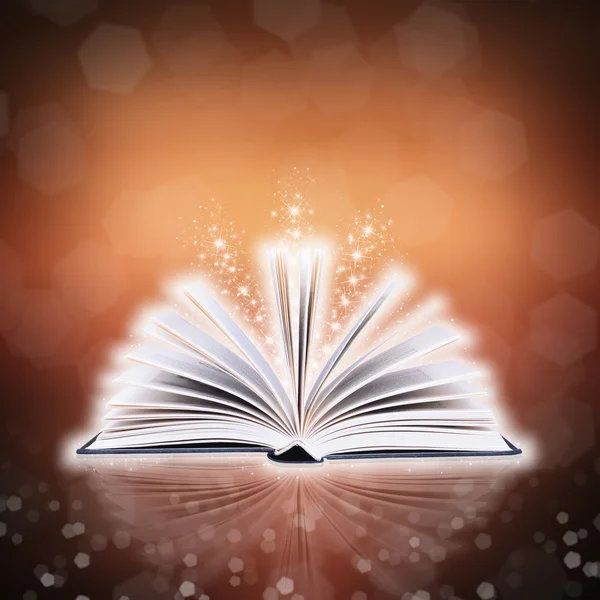 Libro aperto con bokeh luce e sfondo astratto — Foto Stock