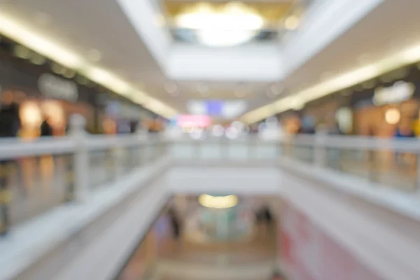 Abstrato desfocado bokeh fundo de shopping center, profundidade rasa de foco — Fotografia de Stock