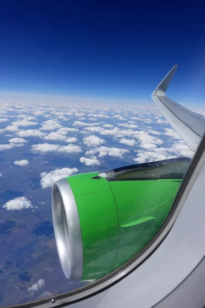 Wings of an airplane flying — Stock Photo, Image