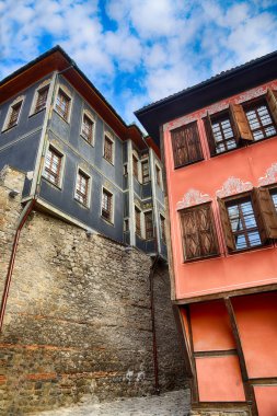 Typical architecture,historical medieval houses,Old city street view with colorful buildings in Plovdiv, Bulgaria. Ancient Plovdiv is UNESCO's World Heritage.HDR image clipart