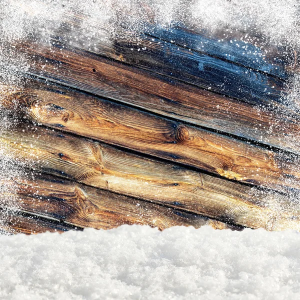 Snowdrifts. In the background old wooden wall with blank space — Stock Photo, Image