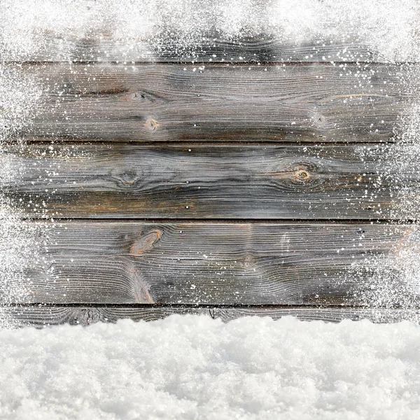 Deriva de nieve. En el fondo vieja pared de madera con espacio en blanco — Foto de Stock